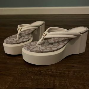 Coach platform flip flops